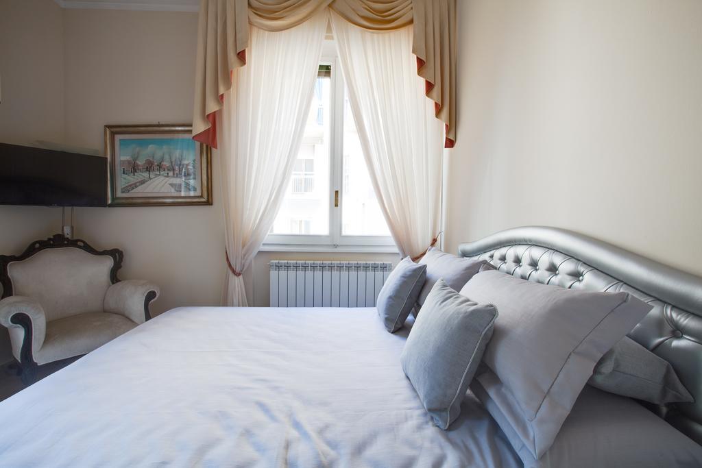 Kometa Suites & Apartments Φλωρεντία Δωμάτιο φωτογραφία